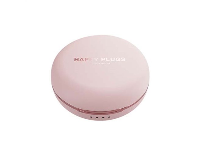 ピンク ワイヤレスイヤフォン 充電ケース付き Happy Plugs、ミラー装備の充電ケースが付属した完全ワイヤレス