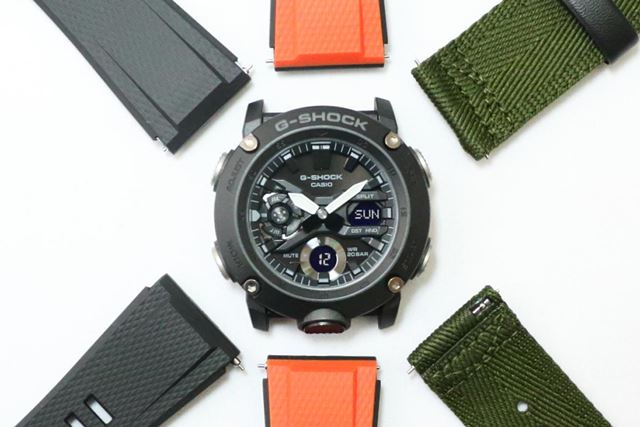 �uG-SHOCK�v���̃o���h�t���ւ��^�́A�J�[�{���Łg�ŋ��h���A�b�v�f�[�g