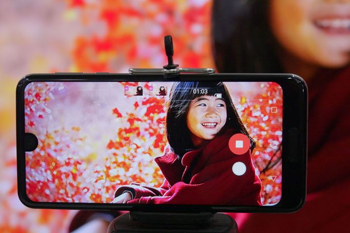 ̎BeɁA^{^̉ɕ\ꂽVb^[{^Ǝʐ^Beł