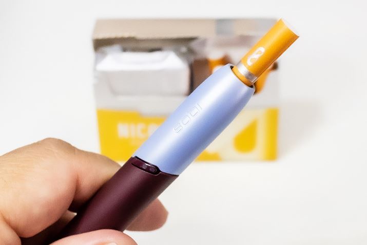 �t�B���^�[�ɋP���u0�v���`�[�t�̃��S