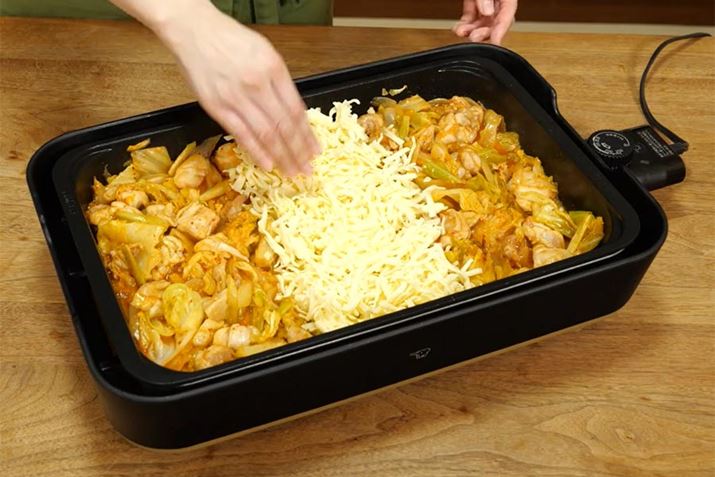 v[g̉΂~߂ĂA^񒆂̃Xy[XɃsUp`[Yi250gjÂ܂܃t^Ė5u܂