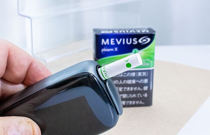 JvŹAtB^[̏㕔i[ɋ߂ꏊjɓ