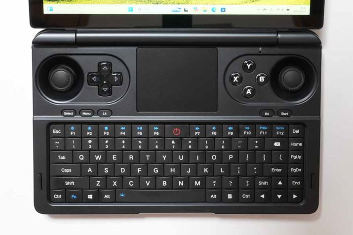 L[{[h㕔ɂ͍/EWCXeBbNApbhAABXY{^ȂǃQ[pbh̃{^zu