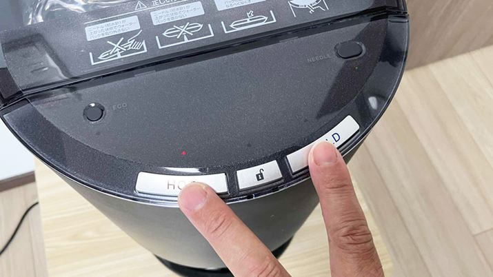 ^񒆂́uUNLOCK{^văbNAuHOT{^vƁuCOLD{^v𓯎ɉďo܂